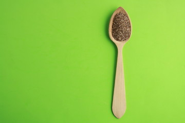 wooden spoon with black chia seeds