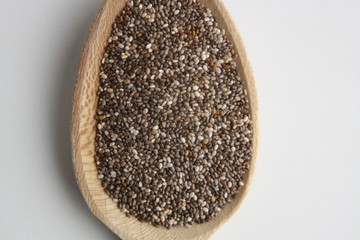 wooden spoon with black chia seeds