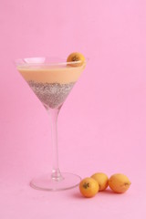 glass with chia and medlars pudding