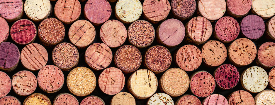 Wine corks Pattern. Various wooden wine corks  as a Background. Food and drink concept .
