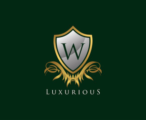 Classy Shield W Letter Logo. Gold Vintage Shield With W Letter prefect for boutique, hotel, restaurant, wedding and other elegant business. 