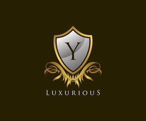 Classy Shield Y Letter Logo. Gold Vintage Shield With Y Letter prefect for boutique, hotel, restaurant, wedding and other elegant business. 