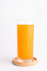 Fresh orange juice glass on white background