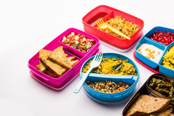 group of Lunch Box / Tiffin for Indian kids, showing variety or multiple option or combination of healthy food for your school going children