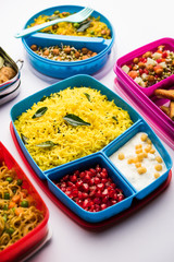 group of Lunch Box / Tiffin for Indian kids, showing variety or multiple option or combination of healthy food for your school going children
