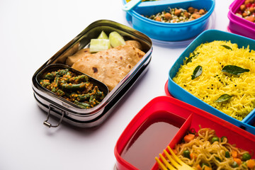 group of Lunch Box / Tiffin for Indian kids, showing variety or multiple option or combination of healthy food for your school going children