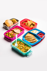 group of Lunch Box / Tiffin for Indian kids, showing variety or multiple option or combination of healthy food for your school going children