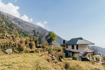 Beautiful landscape with hotel in the mountain valley, in Dharamsala,India.