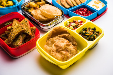 group of Lunch Box / Tiffin for Indian kids, showing variety or multiple option or combination of healthy food for your school going children