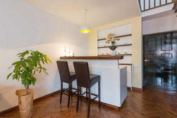 Kitchen interior with dining area in loft apartment