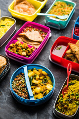 group of Lunch Box / Tiffin for Indian kids, showing variety or multiple option or combination of healthy food for your school going children