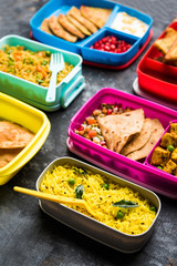 group of Lunch Box / Tiffin for Indian kids, showing variety or multiple option or combination of healthy food for your school going children