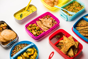 group of Lunch Box / Tiffin for Indian kids, showing variety or multiple option or combination of healthy food for your school going children