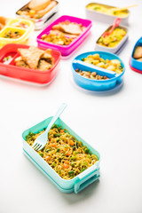 group of Lunch Box / Tiffin for Indian kids, showing variety or multiple option or combination of healthy food for your school going children