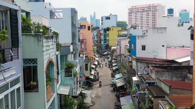 Landscape Ho Chi Minh city take by drone on the sunset with building , downtown street and public transport - at Viet Nam