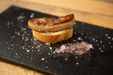 Spanish foie tapa with lilac sauce and bread