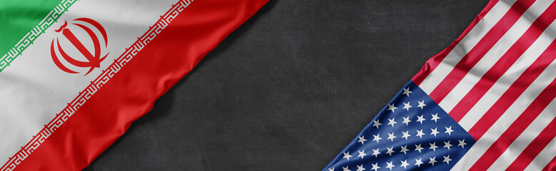 Flags of Iran and the United States of America with copy space © Zerbor