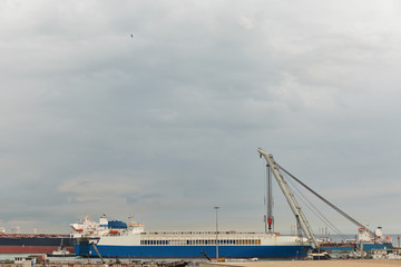 Fototapeta na wymiar Livorno industrial port at dawn, Italy.