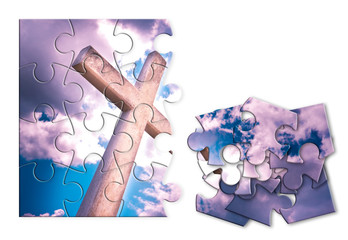 Rebuild our faith or losing faith - Christian cross against a cloudy sky - concept image in jigsaw...