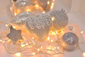 Sparkle gloss silver heart Shiny Christmas Xmas New Year decorations sparkling decor with shines lights. Beautiful Christmas picture background. Winter holidays decor festive. 