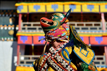 Tawang, Arunachal Pradesh, India, Buddhist monk dancing in disguise for the Torgya  festival, in...