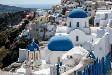 Three Blue Domes church Santorini Oia village in Santorini island, Greece.