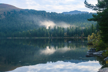 lake in the mountains with cloud