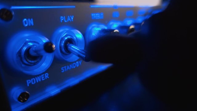 turning on and preparing the guitar amp for recording and playback
