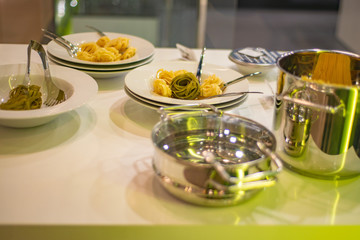 kitchen utensils: pots, plates with food