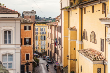 Old cobblestone narrow street in Rome, Italy