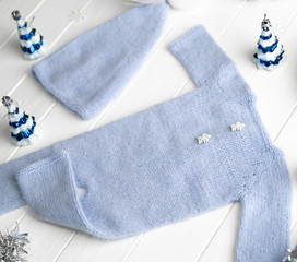 Blue knitted clothes for babies