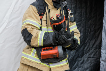 Fototapeta premium Firefighter ready for action he is ready for deployment