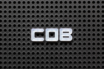 Black color pegboard with white letter in word COB (abbreviation of close of business)