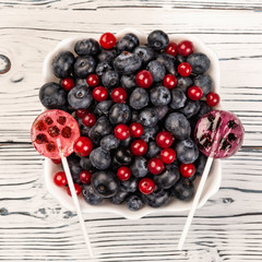 .Lollipops made from natural fruits and berries. Healthy food and vegetarian food concepts