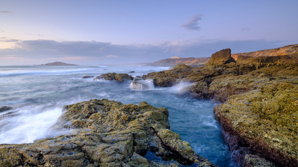 Sunset near Illha do Pessequiro (the 'Peachtree') along the Vincentine Coast National Park in the southwest of Alentejo region, Portugal