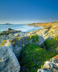 Sunset near Illha do Pessequiro (the 'Peachtree') along the Vincentine Coast National Park in the southwest of Alentejo region, Portugal