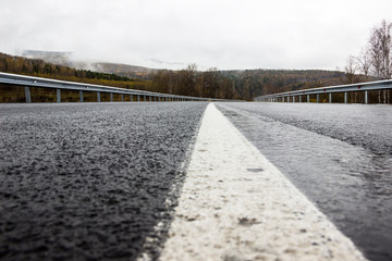 wet slippery road in bad weather