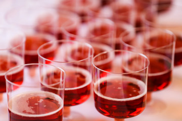 Sparkling wine in plastic glasses