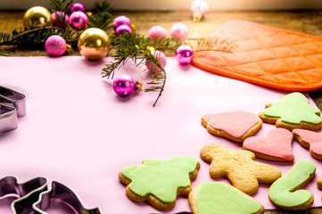 Christmas ginger biscuits on pink