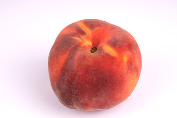 Top view on summer harvested red juicy peach on white background