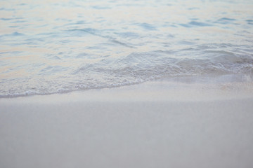 Sand and wave at the beach