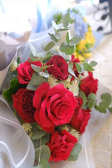 Macro view of colorful blue red green white pink orange purple rose flower bouquet in full blossom
