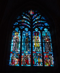 a detailed view of a stained glass window in the Basilica de Saint-Sauveur in Dinan in Brittany