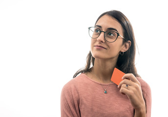 A woman with a credit card in her hand