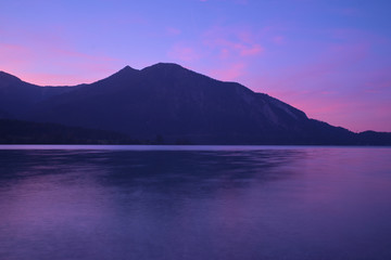 Fototapeta na wymiar Sunrise over a lake in the Alps