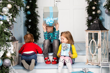 kids with their christmas presents