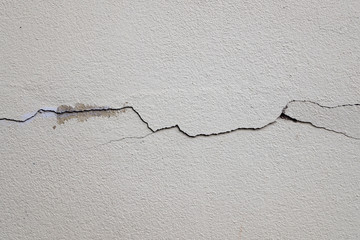 The clack was appeare on white concrete background, Cement wallpaper