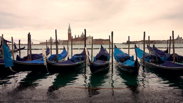 4k video of Gondola boat in Venice, Italy. Venetian famous touristic symbol