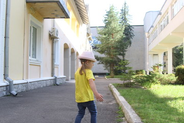 young woman walking on the street