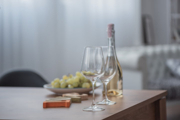 Two wine glasses, grape and wine bottle